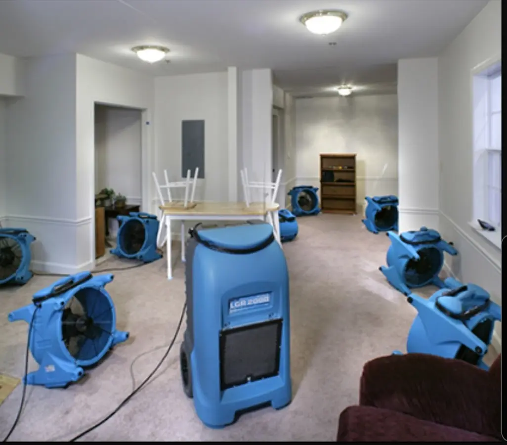 Air movers and dehumidifier setup for Water Extraction & Removal in Crowley